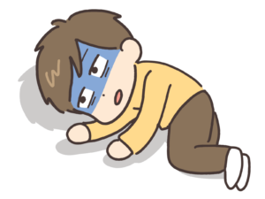 青ざめて横になっている男性