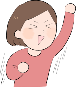 左手を突き上げて歓喜する女性