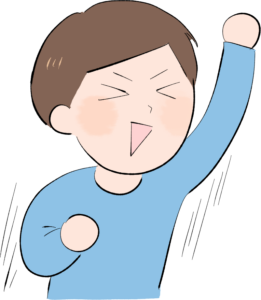 腕を突き上げて歓喜する男性