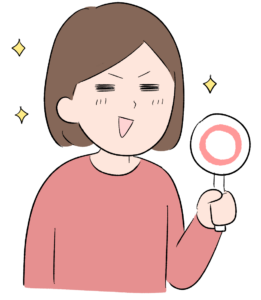 正解の札を持ってキラキラしている女性