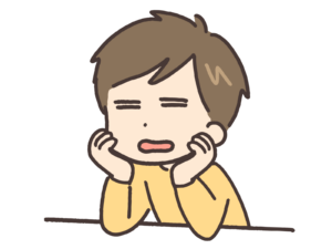 頬杖をついて考え込んでいる男性